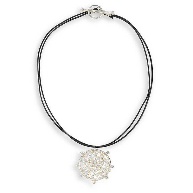 Pearl and Silver Medallion on Black Leather