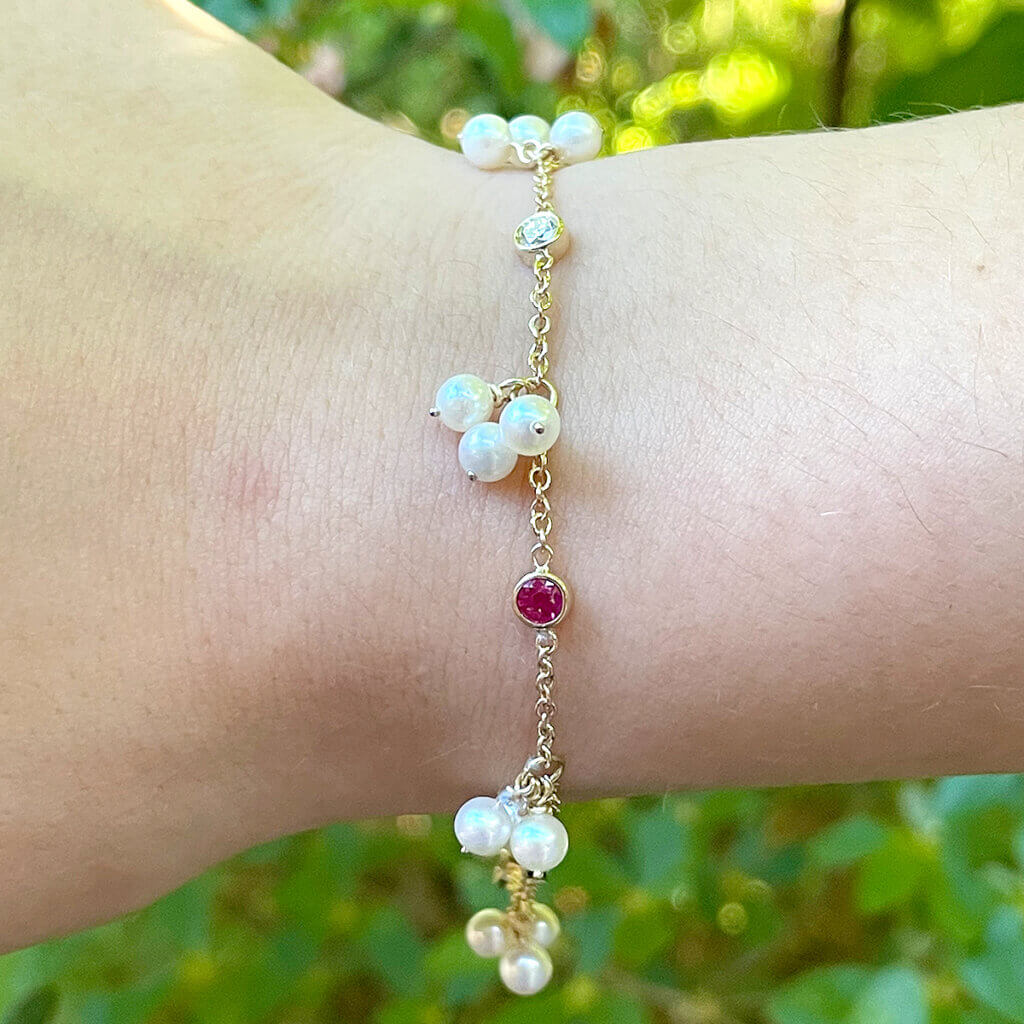 The finished bracelet designed to complement the client's pearl earrings.