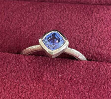 Stone purchased at Mia Gemma's Gem Roundtable. Client wanted a simple design by Liaung Chung Yen to showcase the amazing blue of the tanzanite.