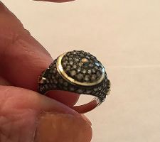 Client wanted a unique signet ring that would use her spare diamonds.
