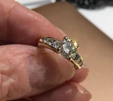 Client brought us her grandmother's diamond and we designed this ring for her together.