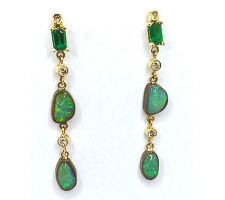 The Greens and Blues of these Australian Boulder Opals, Tsavorite Garnets and Diamonds come together beautifully in these custom earrings.