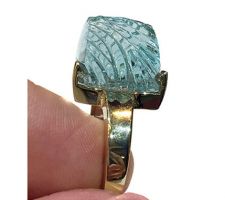 This spectacular John Dyer aquamarine was purchased at our Gemstone Roundtable. The 14k gold setting was designed and created by Dyanne Belle.