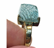 This spectacular John Dyer aquamarine was purchased at our Gemstone Roundtable. The 14k gold setting was designed and created by Dyanne Belle.