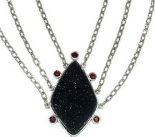 Druzy and garnets from our Gemstone Roundtable are set in this dramatic necklace with dark rhodium plated silver.