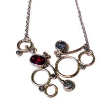Druzy, sugilite and spessartite garnet from our Gemstone Round Table bezel set in sterling silver.