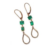 These 14k gold earrings were created by Dyanne Belle with emeralds provided by the client.