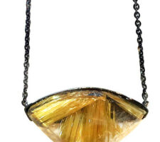 Gorgeous gold rutilated quartz from our Gemstone Roundtable made into this statement necklace in dark rhodium plated silver.