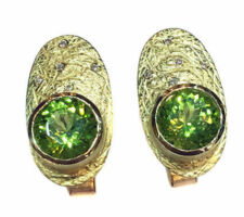 Gorgeous peridot stones purchased at our Gemstone Roundtable and set in 18k yellow gold with diamonds by Liaung Chung Yen.