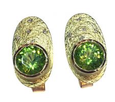 Gorgeous peridot stones purchased at our Gemstone Roundtable and set in 18k yellow gold with diamonds by Liaung Chung Yen.