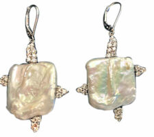 Pearl purchased at our Gemstone Roundtable. Client wanted to use her diamonds to create this design in 14K White Gold.
