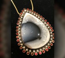 Client Brought Us This Amazing Opal and Wanted Ideas for Setting. Red Rubies and Pearls Dramatically Surround the Opal in 14K Yellow Gold