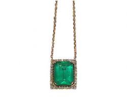 Originally a ring, this emerald and diamond necklace was created by Dyanne Belle for one of our clients.