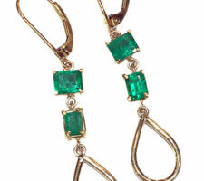 These 14k gold earrings were created by Dyanne Belle with emeralds provided by the client.