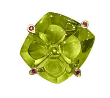 This gorgeous citrine gem was purchased at our Gemstone Roundtable and was custom cut by John Dyer. It was set in 18k yellow gold with rubies; designed by Odaybea Morrow, created by Catherine Rudacille.