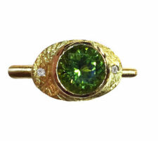 Gorgeous peridot stone purchased at our Gemstone Roundtable and set in 18k yellow gold with diamonds by Liaung Chung Yen.