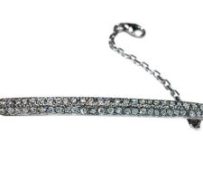 Repurposed diamonds pave set in 14k white gold to create a stunning bracelet.