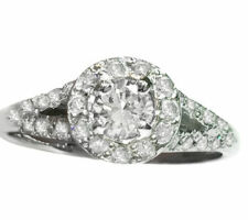 Dyanne Belle designed this lovely engagement ring using 14k white gold and additional diamonds for the pave work.