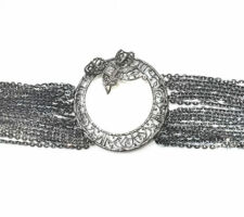 Repurposed grandmother’s diamond brooch into sparkling bracelet with diamond cut white rhodium plated chain.