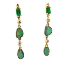 The Greens and Blues of these Australian Boulder Opals, Tsavorite Garnets and Diamonds come together beautifully in these custom earrings.